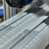 The Bottle Gripper Elevator (also Known As Clamp-Type Bottle Elevator Or Bottle Clamp Conveyor)